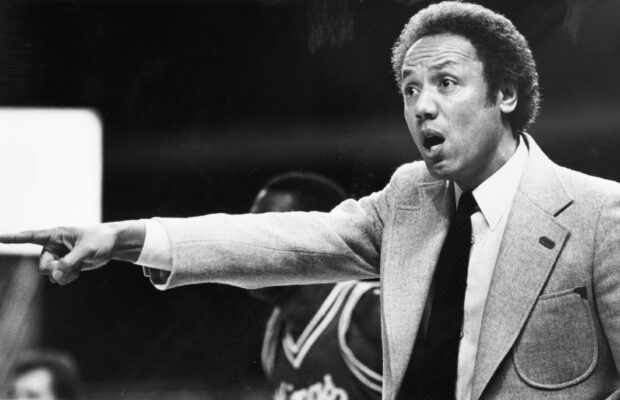 Black and white photograph of Lenny Wilkens coaching a Seattle SuperSonics game in December 1982.