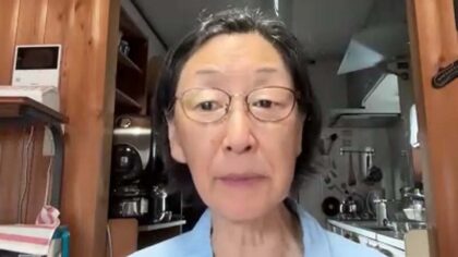 Photograph of Laura Lee Kusaka being interviewed at her home.