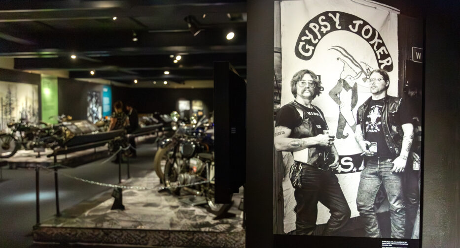 A photo showing two members of the Gypsy Joker Motorcycle Club at the MOHAI Kickstands Up! exhibit in downtown Seattle, WA.