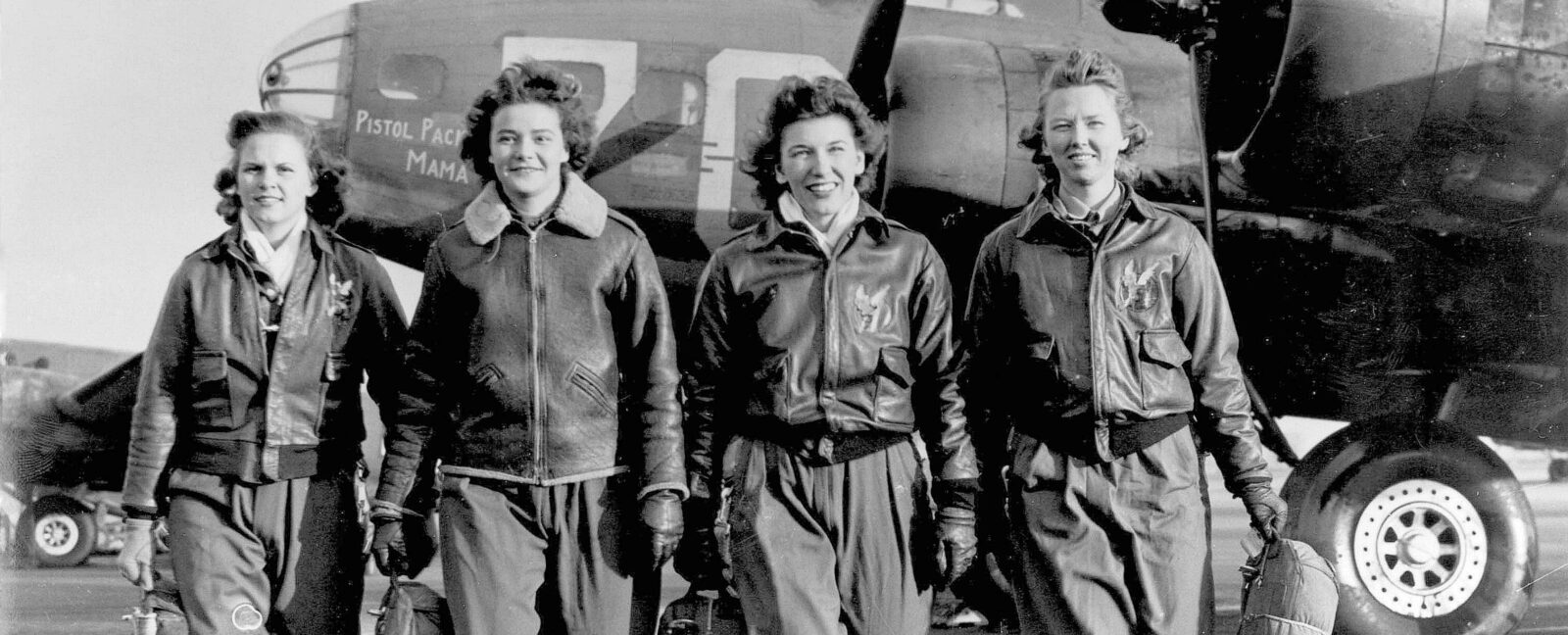 A Women's Airforce Service Pilots flight team walks from the "Pistol Packin' Mama." Photo courtesy of WASP Museum.