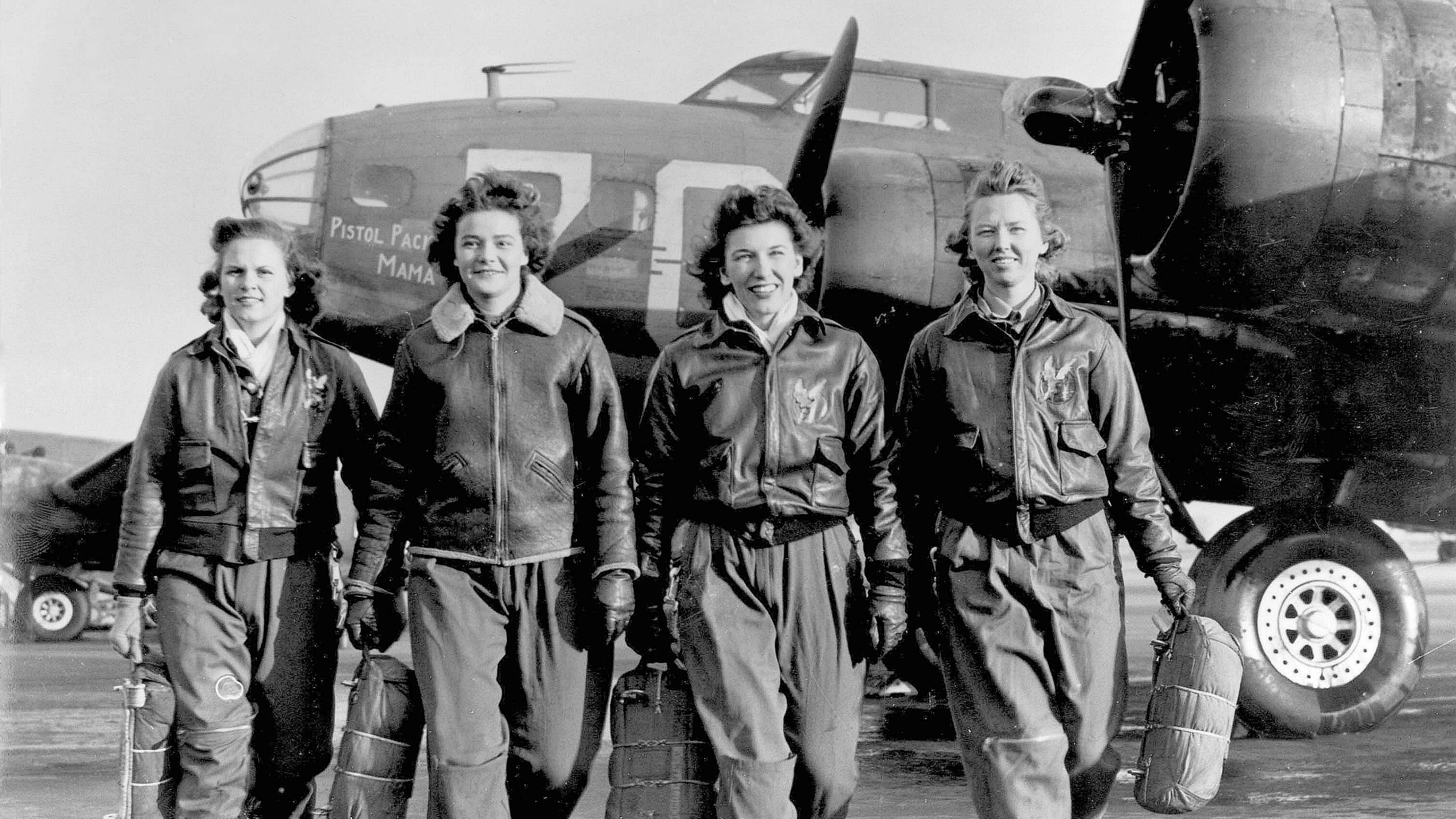 A Women's Airforce Service Pilots flight team walks from the "Pistol Packin' Mama." Photo courtesy of WASP Museum.