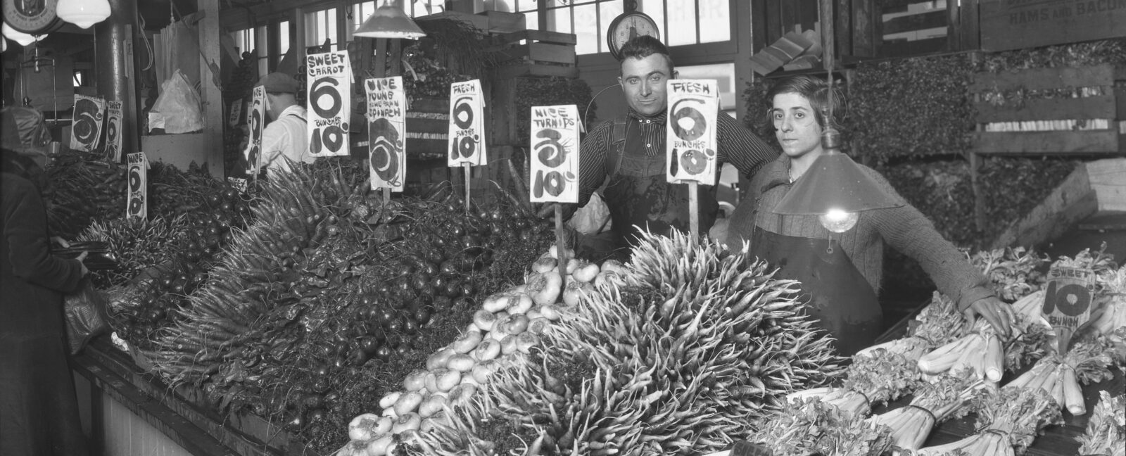Vendors selling vegetables at Pike Place Market, November 3, 1962.