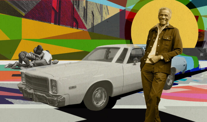 Al Doggett standing adjacent to a car from the 1970s. Three children play football in the background.